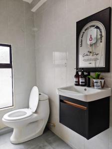 Koupelna v ubytování Suite Us Guesthouse Kubang Kerian + 22 fotografií