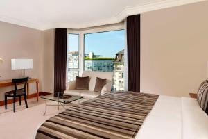 Postel nebo postele na pokoji v ubytování Hotel President Wilson, a Luxury Collection Hotel, Geneva