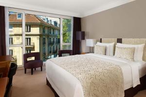 Postel nebo postele na pokoji v ubytování Hotel President Wilson, a Luxury Collection Hotel, Geneva