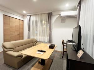 Μια τηλεόραση ή/και κέντρο ψυχαγωγίας στο Condominium View Mt Hakodate