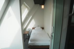 Postel nebo postele na pokoji v ubytování Hostel JAZ