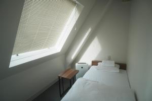 Postel nebo postele na pokoji v ubytování Hostel JAZ