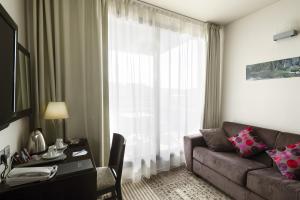 Posezení v ubytování Mercure Aix-en-Provence La Duranne Gare TGV