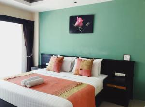 Vuode tai vuoteita majoituspaikassa MM Hill Koh Samui Hotel - SHA Certified 26 kuvaa lisää