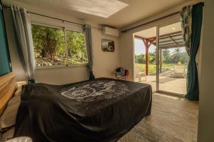 Llit o llits en una habitació de Soleil Couchant