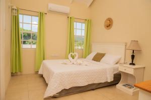 Giường trong phòng chung tại La Gentillesse Apartments - Modern, Comfortable and Quiet