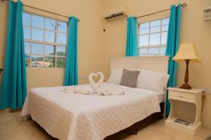 Giường trong phòng chung tại La Gentillesse Apartments - Modern, Comfortable and Quiet