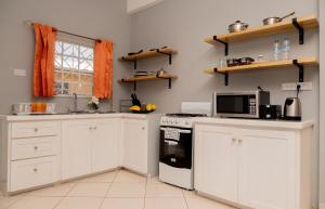 Nhà bếp/bếp nhỏ tại La Gentillesse Apartments - Modern, Comfortable and Quiet