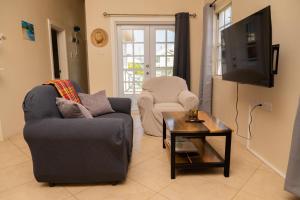 TV/trung tâm giải trí tại La Gentillesse Apartments - Modern, Comfortable and Quiet