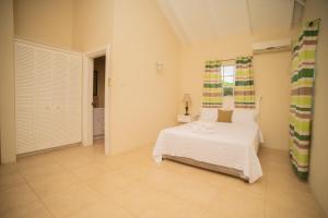 Giường trong phòng chung tại La Gentillesse Apartments - Modern, Comfortable and Quiet