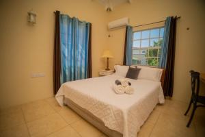 Giường trong phòng chung tại La Gentillesse Apartments - Modern, Comfortable and Quiet