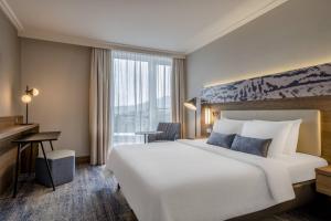 Voodi või voodid majutusasutuse Courtyard by Marriott Linz toas