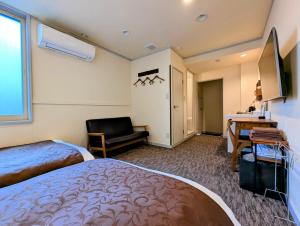 TV a/nebo společenská místnost v ubytování Kanazawa Station Hotel