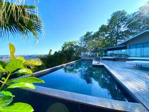 a swimming pool on the side of a house at Balmoral 575 in Montville