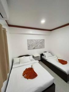 Postel nebo postele na pokoji v ubytování Casa Loubel Beach Resort + 33 fotografií