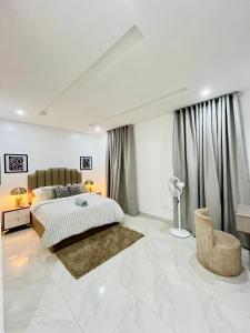 Postel nebo postele na pokoji v ubytování Mide Apartment Ajah Lagod