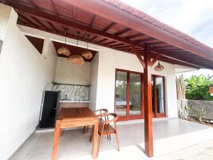 A balcony or terrace at The Wise Ubud