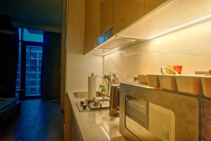 Kuchyň nebo kuchyňský kout v ubytování Paradise Point + 14 fotografií