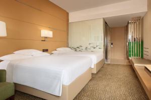Letto o letti in una camera di Courtyard by Marriott Hong Kong Sha Tin