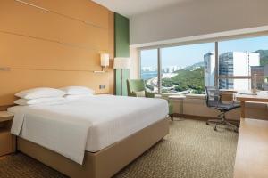 Letto o letti in una camera di Courtyard by Marriott Hong Kong Sha Tin