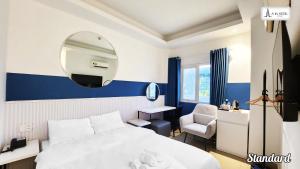 Postel nebo postele na pokoji v ubytování A In Hotel Atistar
