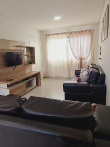 Μια τηλεόραση ή/και κέντρο ψυχαγωγίας στο Casa Duplex a 6 mim do Beto Carrero e 3 min da Praia