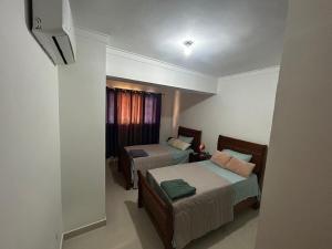 Ένα ή περισσότερα κρεβάτια σε δωμάτιο στο Tu guarida +24 φωτογραφίες