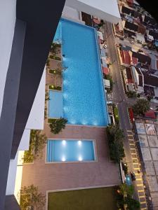 Bazén v ubytování Sunshine Residence nebo v jeho okolí