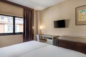 Кровать или кровати в номере AC Hotel Zamora by Marriott +25 фотографий
