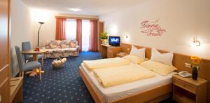 Postel nebo postele na pokoji v ubytování Hotel Bergblick