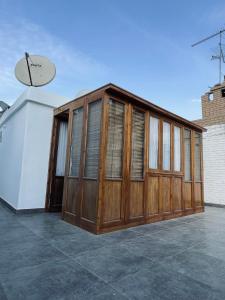 a building with wooden doors on a patio at Unique Studio in Cairo
