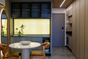 Nhà bếp/bếp nhỏ tại New Time Conforto e Sofisticacao a Beira Mar