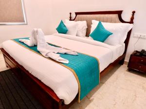 Voodi või voodid majutusasutuse Radha Kunj Resort Pushkar toas