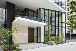an external view of a building at Courtyard by Marriott Osaka Honmachi in Osaka
