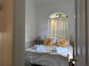 Katil atau katil-katil dalam bilik di Celestial Dew Guesthouse in Tyalgum