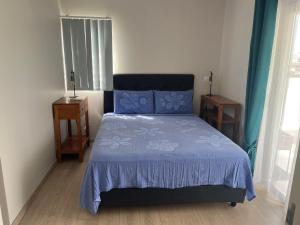 Standing Residence Tevai客房内的一张或多张床位