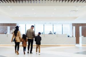 a family walking through an art museum at New York Marriott Marquis in New York