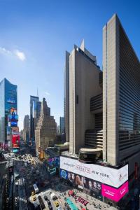 a view of a busy city with buildings and traffic at New York Marriott Marquis in New York