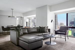 a living room with a couch and a table at New York Marriott Marquis in New York