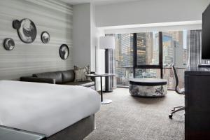 a living room with a couch and a table at New York Marriott Marquis in New York