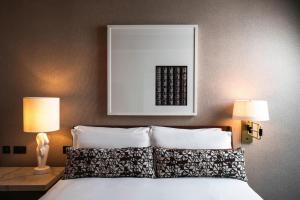 Postel nebo postele na pokoji v ubytování Bankside Hotel, Autograph Collection