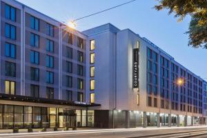 a rendering of the front of a building at Courtyard by Marriott Munich City East in Munich