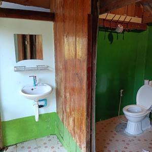 a bathroom with a sink and a toilet at Sweet Nature Bungalow in Koh Rong Island +135 photos