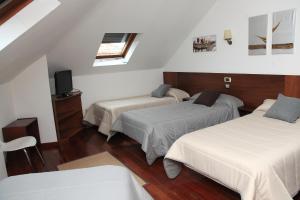 Cama o camas de una habitación en Hotel Restaurante Rúas