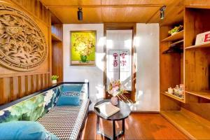 Χώρος καθιστικού στο Quiet Garden Inn Lijiang Old Town Branch