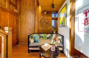 Χώρος καθιστικού στο Quiet Garden Inn Lijiang Old Town Branch