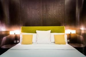 Un pat sau paturi într-o cameră la Azalaï Hôtel Nouakchott