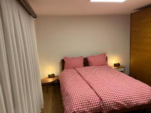 Postel nebo postele na pokoji v ubytování Residence A