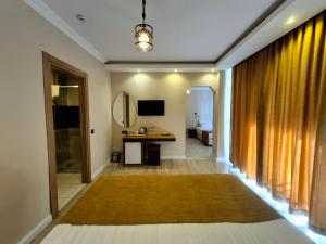 TV a/nebo společenská místnost v ubytování Toprak Apart Otel