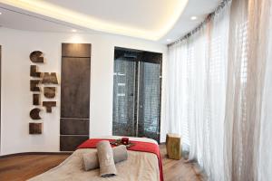 Postel nebo postele na pokoji v ubytování Hotel Traube Tonbach
